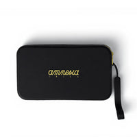 A black zippered pouch with a wrist strap, featuring the brand name 'amnesia' in gold cursive script and 'IBIZA' in smaller gold block letters on the front, set against a plain white background.